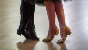 Closeup of dancer's legs as they do the ballroom dance.